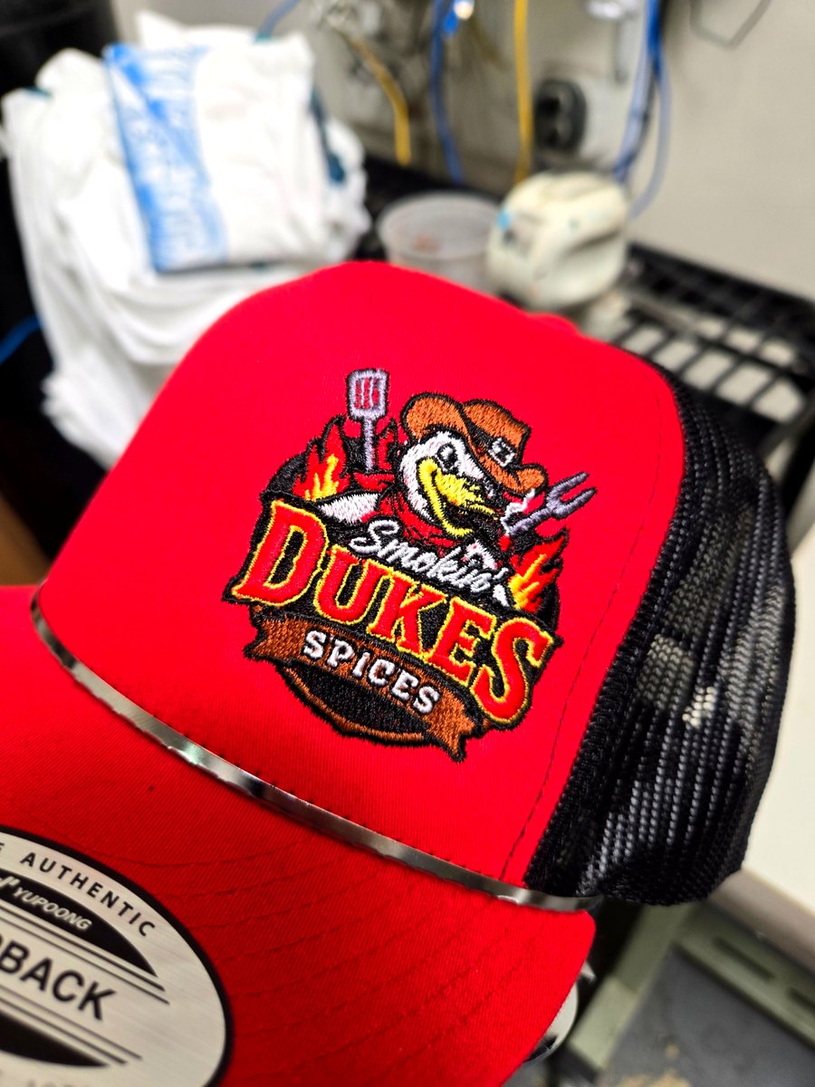 Smokin' Dukes Spices embroidered trucker hat by Russell's Print Shop